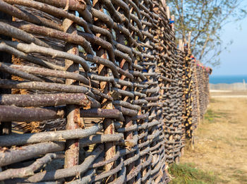 Close-up of rusty stack on field