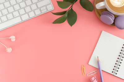 High angle view of laptop and book on table