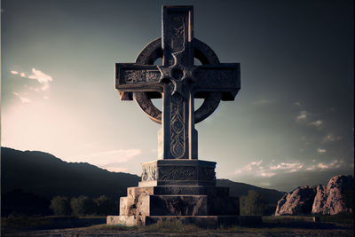 Low angle view of statue against sky