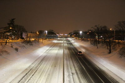 Light trails on road at night