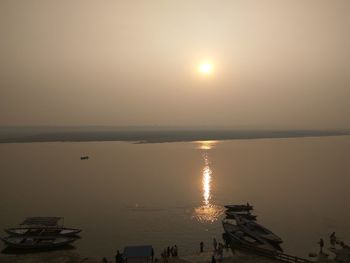 Scenic view of sea against sky at sunset