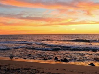 Scenic view of sea against sky during sunset