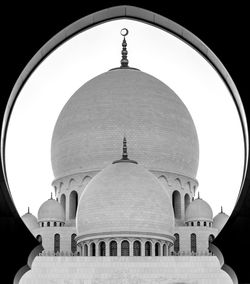 Sheikh zayed grand mosque seen through arch