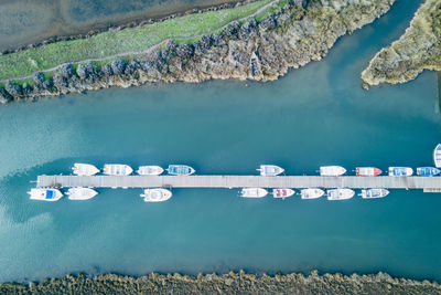 High angle view of boots moored at harbor