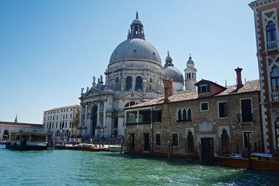 View of canal against clear sky