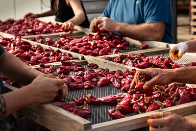 Group of people at market stall