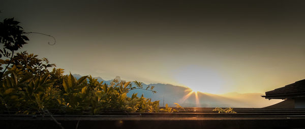 Scenic view of mountains against sky during sunset