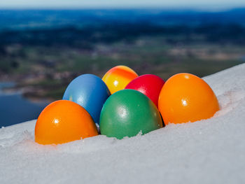 Close-up of multi colored candies on land