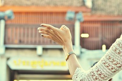 Close-up of woman hand using smart phone