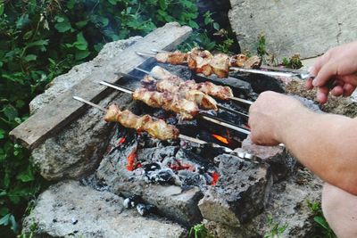 Cropped image of man preparing food