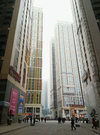 Low angle view of skyscrapers against sky