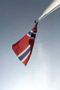 Norway flag in the wind, omaha beach, normandy, france.