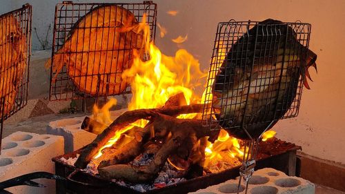 Close-up of fish on barbecue grill, iraqi way.