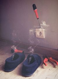 Close-up of machine on table