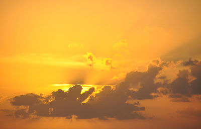 Scenic view of dramatic sky during sunset