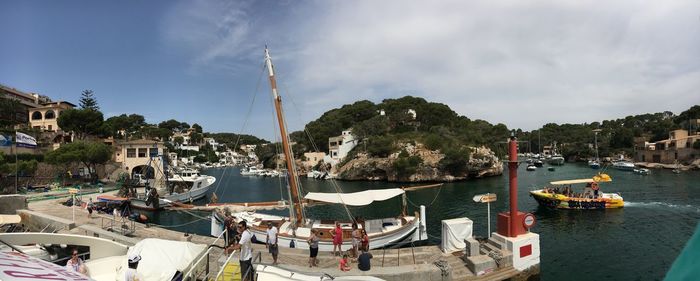 Panoramic view of boats moored in harbor