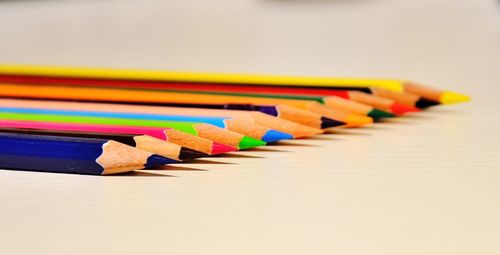 Multi colored pencils on table