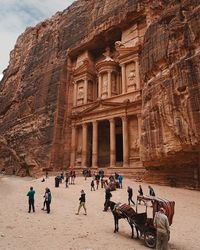 People in front of historical building