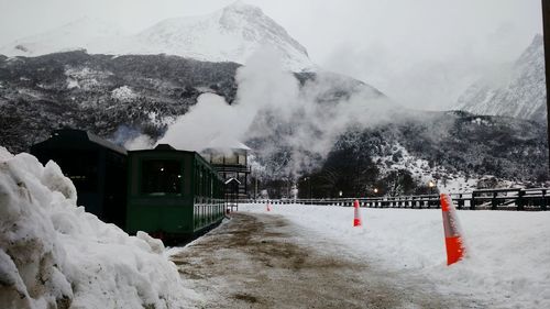 Low angle view of snowcapped mountains during winter