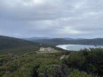 Scenic view of landscape and mountains against sky