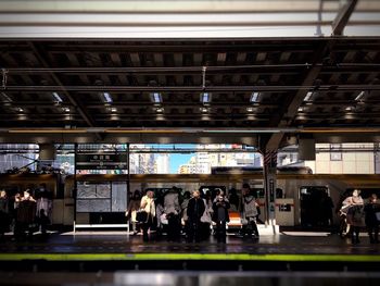 People at railroad station platform