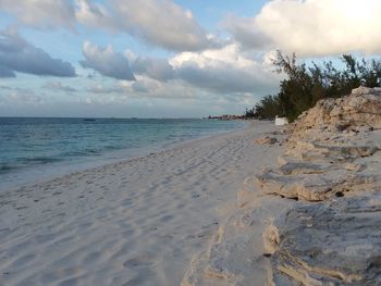 Scenic view of beach against sky