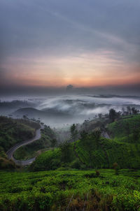 Scenic view of landscape against sky during sunset