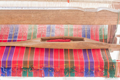 High angle view of multi colored umbrellas on table