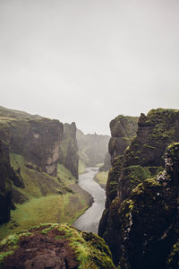 Scenic view of river going through rocky cliffs