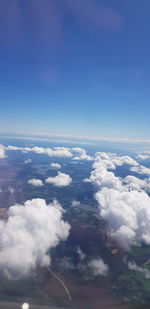 Aerial view of cloudscape against blue sky