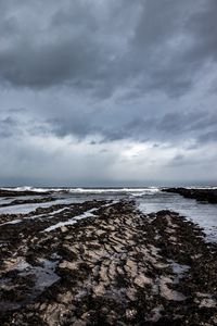 Scenic view of sea against sky during winter