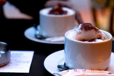 Close-up of coffee cup on table