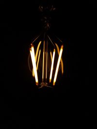 Low angle view of illuminated light bulb