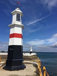 Lighthouse situated on the breakwater at ramsey harbour in the isle of man