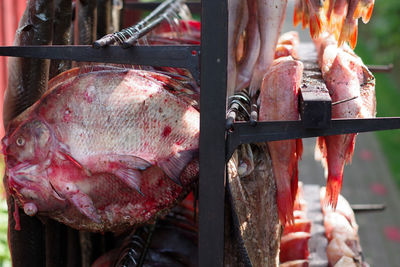 Close-up of meat on barbecue grill