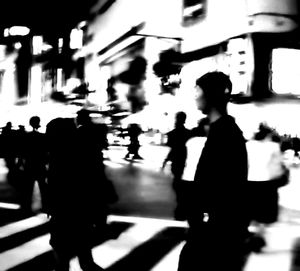 Woman standing by railing