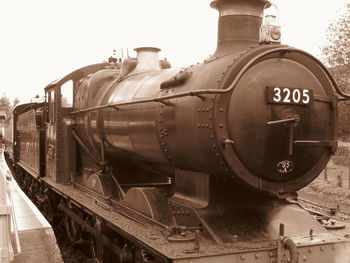 Close-up of train against sky