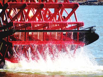 Close-up of red boat in sea