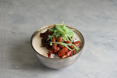 High angle view of chopped vegetables in bowl on table