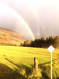 Scenic view of rainbow against sky