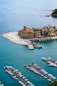 High angle view of harbor by sea