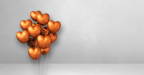 Directly above shot of oranges on table against white background