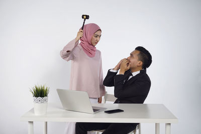 People using laptop on table