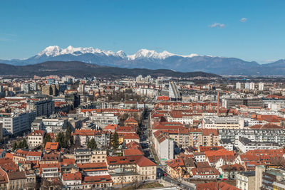 Aerial view of town against sky