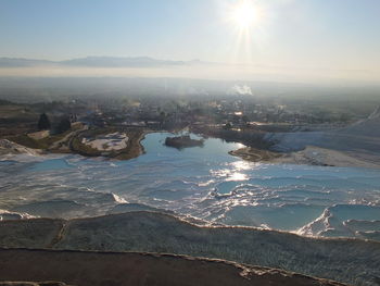 Scenic view of sea against sky during winter