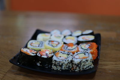 Close-up of sushi served on table