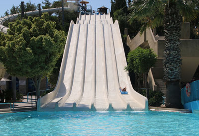 View of swimming pool against building