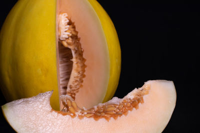 Close-up of pumpkin against black background