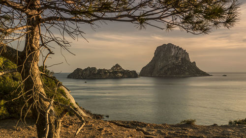 Scenic view of sea against sky at sunset