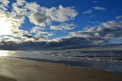 Scenic view of beach against sky